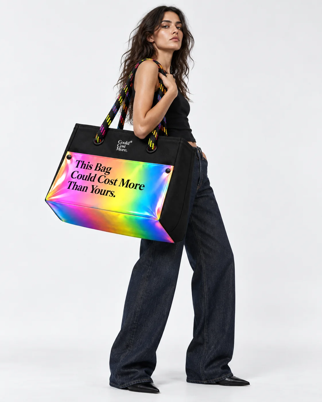 The tote held at the shoulder: what it measures against a person.